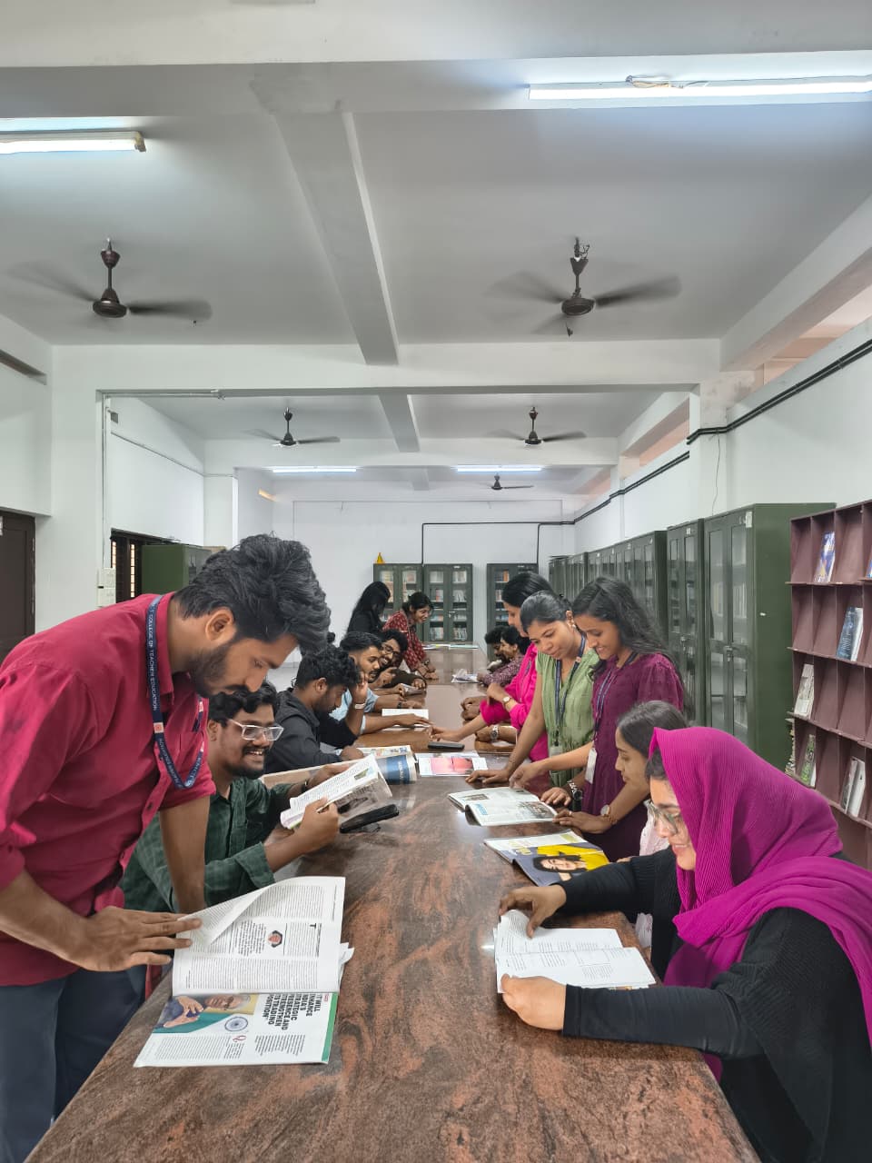 Students reading together in the college library